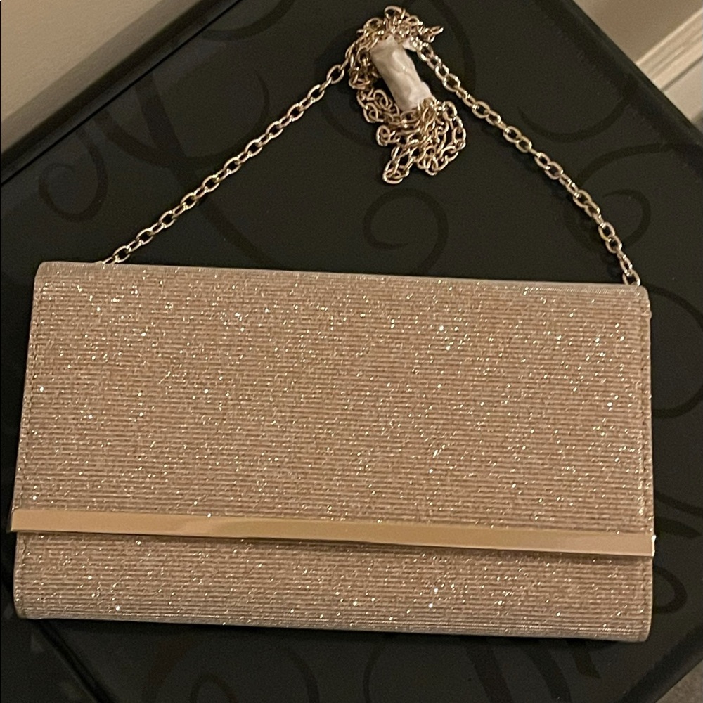 Gold sparkly shoulder clutch